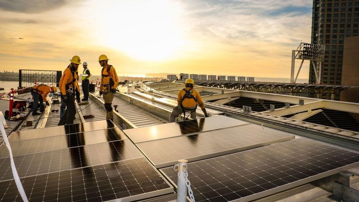Sunshine Solar team installing rooftop solar panels for residential clients in Harda, offering clean energy solutions for homes.